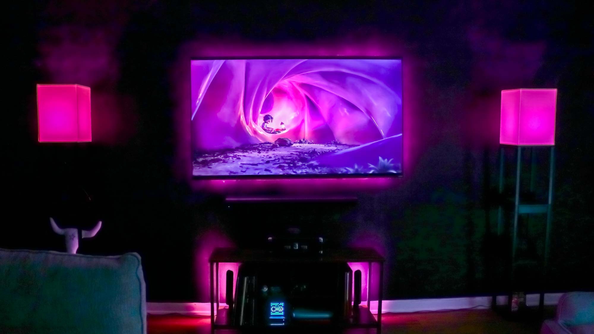 A TV showing The Sea Beast with Philips Hue Sync running