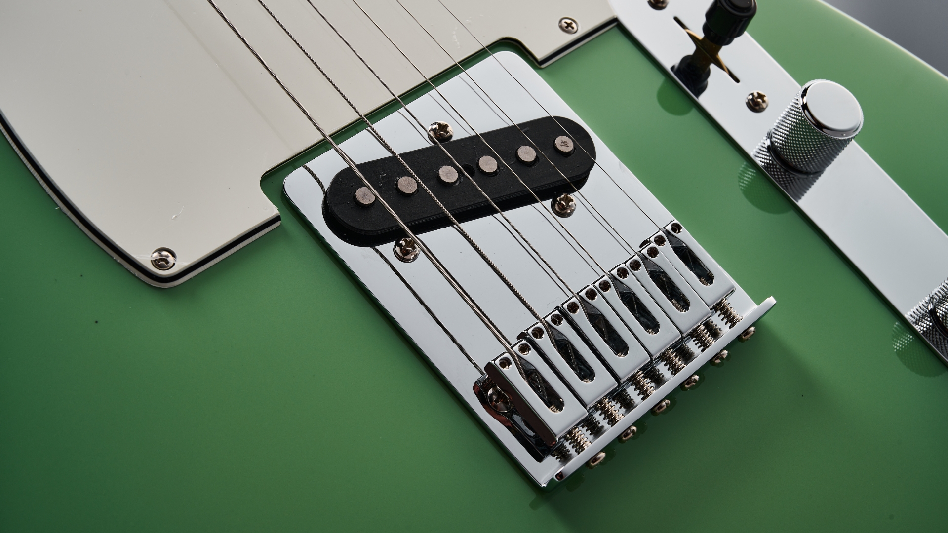 Close up of the bridge pickup on a Fender Player II Telecaster electric guitar
