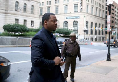 Baltimore police Officer William G. Porter arriving for trial