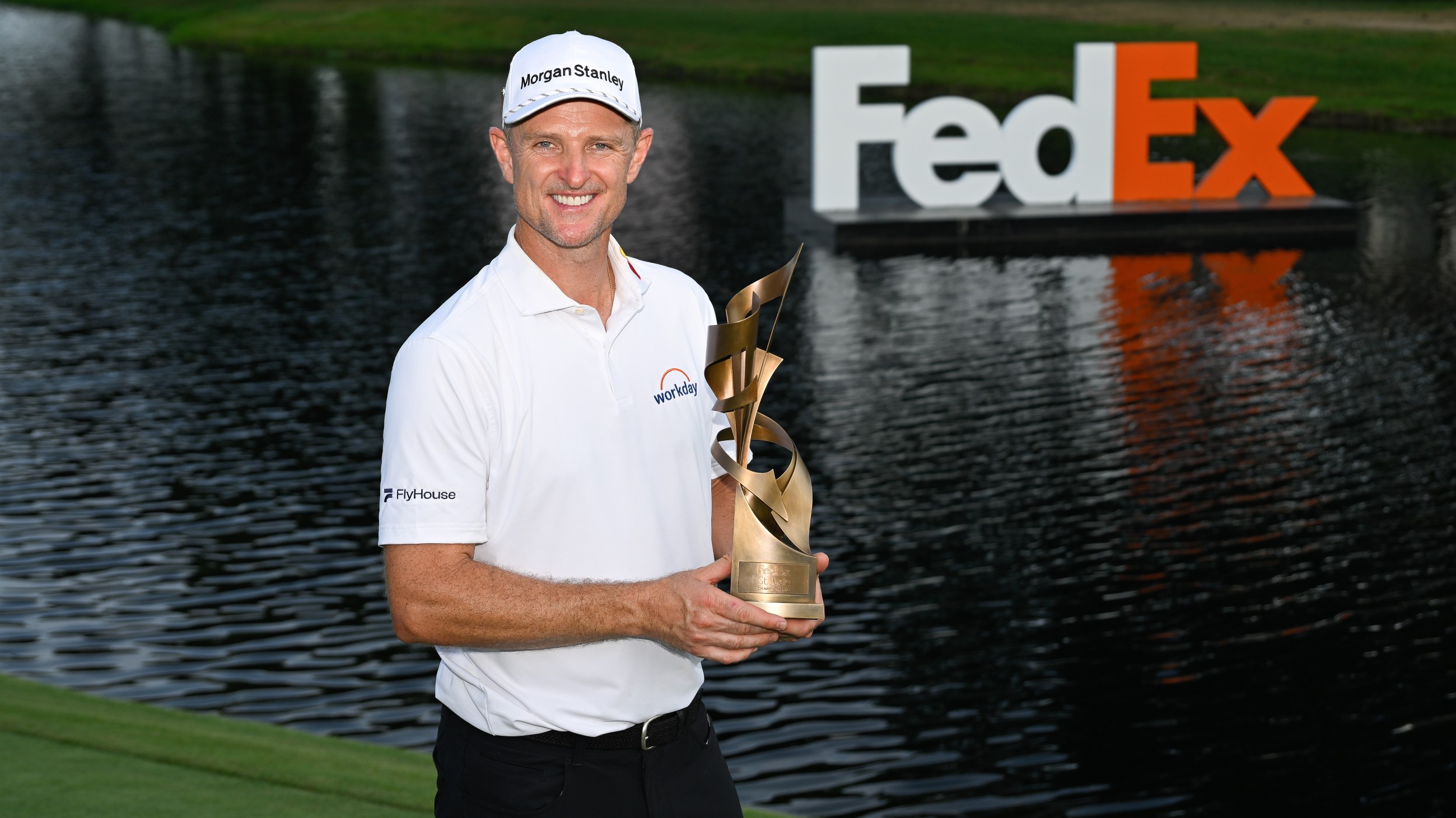 Justin Rose holding the 2025 St Jude Championship trophy