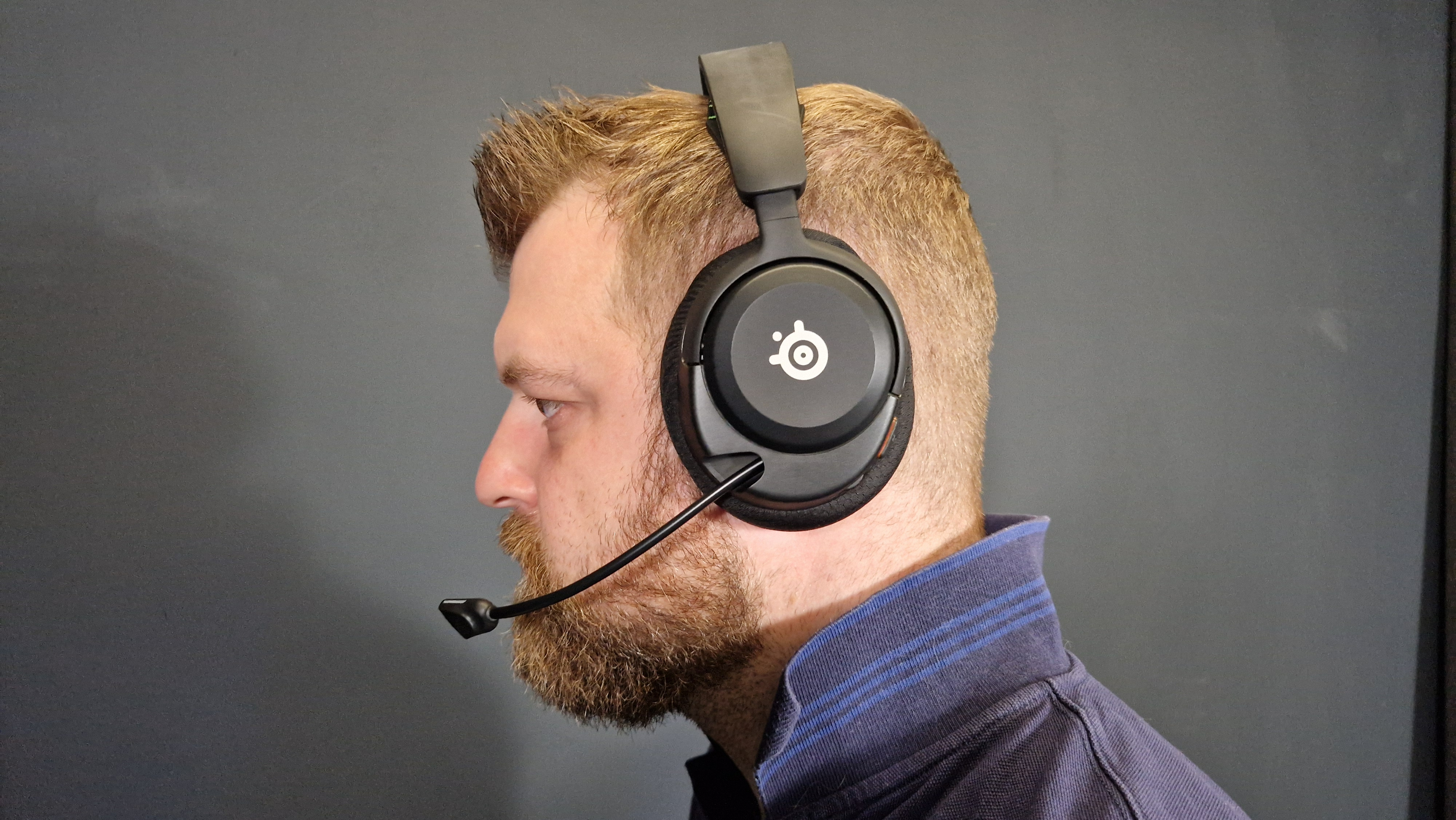 SteelSeries Arctis Nova 5 gaming headset on a man's head