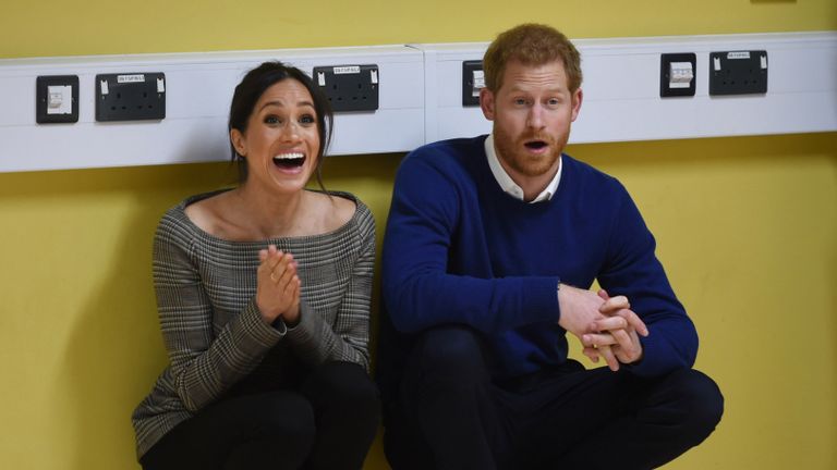 Prince Harry and his fiancee Meghan Markle attend a street dance class during their visit to Star Hub on January 18, 2018 in Cardiff, Wales.