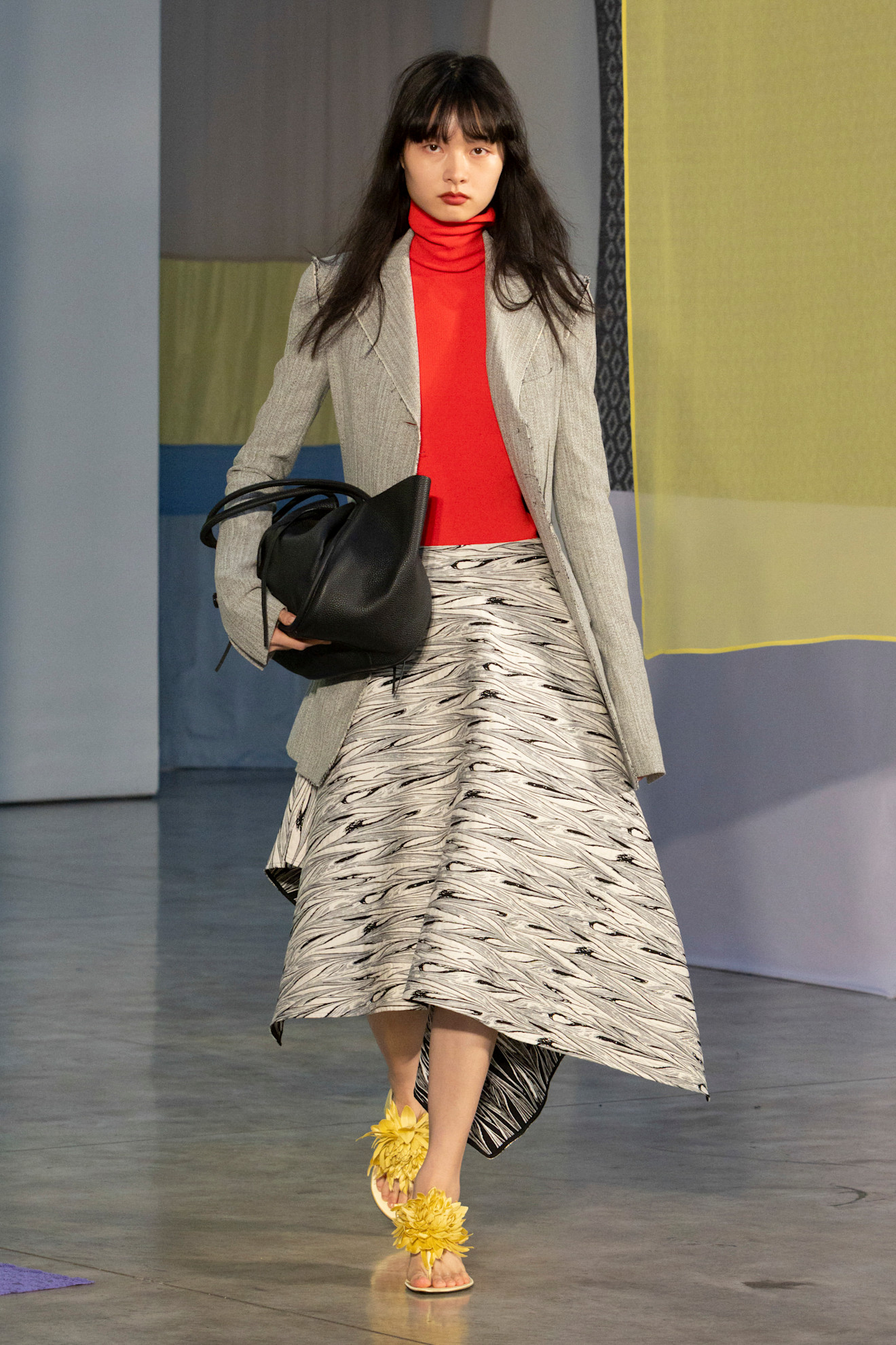 Schouler PO S26 model wears red turtlenkeck skirt and blazer