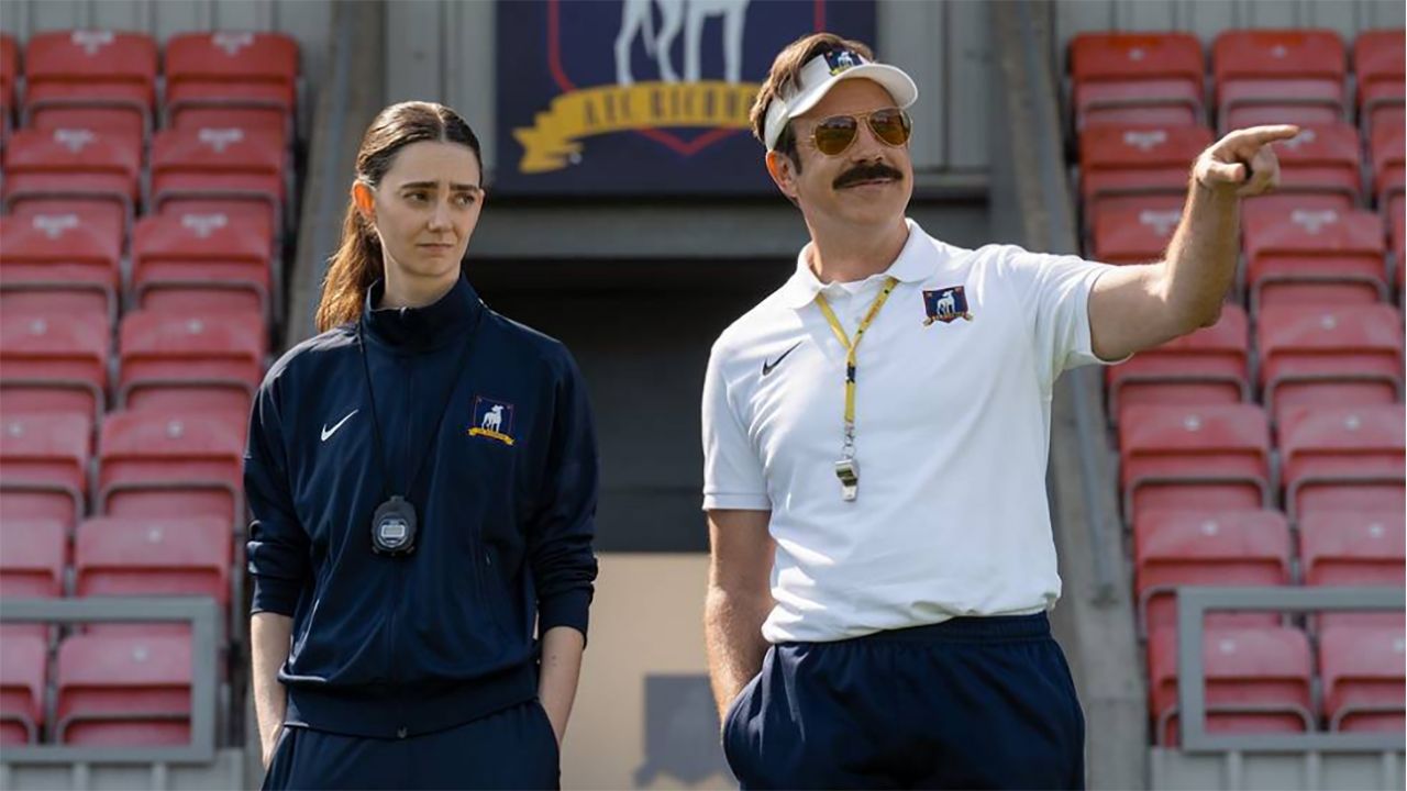Tanya Reynolds' unnamed character standing next to Ted in Ted Lasso season 4