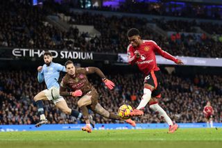 Amad Diallo of Manchester United scores his team's second goal during the Premier League match between Manchester City FC and Manchester United FC at Etihad Stadium on December 15, 2024 in Manchester, England.