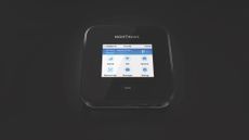 Nighthawk M7 Pro Mobile Router MR7450 on a black background