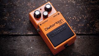 Boss DS-1 Distortion pedal on wooden backdrop