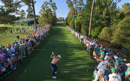 Scottie Scheffler of The United States plays his tee shot on the 18th hole during the final round of the 2024 Masters Tournament at Augusta National Golf Club on April 14, 2024 in Augusta, Georgia.