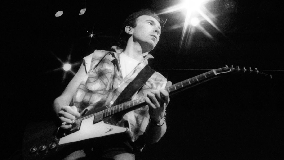 SYDNEY, AUSTRALIA - 1984: Guitarist The Edge with the band &#039;U2&#039; performing live on stage at the Sydney Entertainment Centre during their &#039;Unforgettable Fire&#039; world concert tour in September, 1984 in Sydney, Australia.