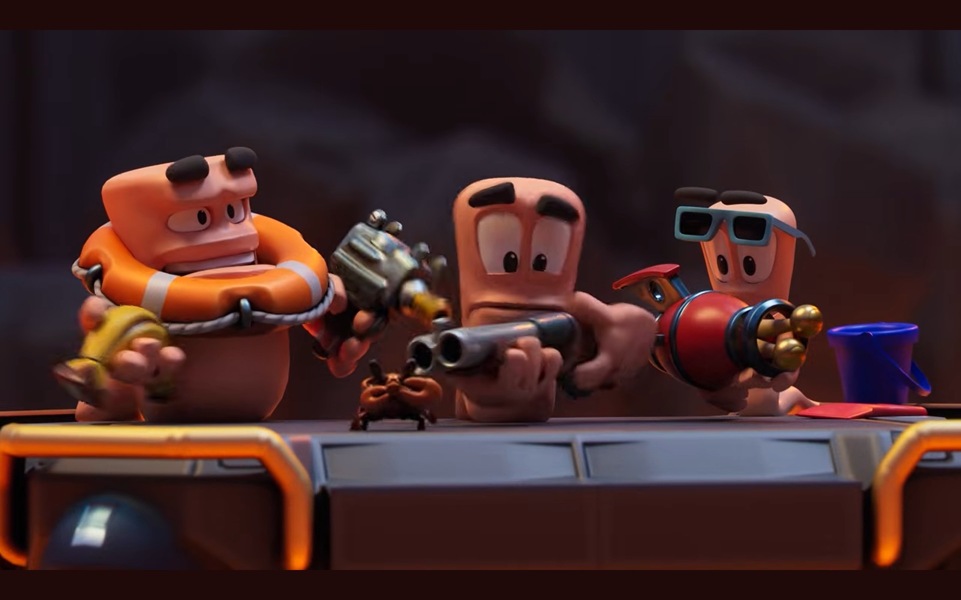 Three worms wielding different weapons in Worms: Galactic Tactics