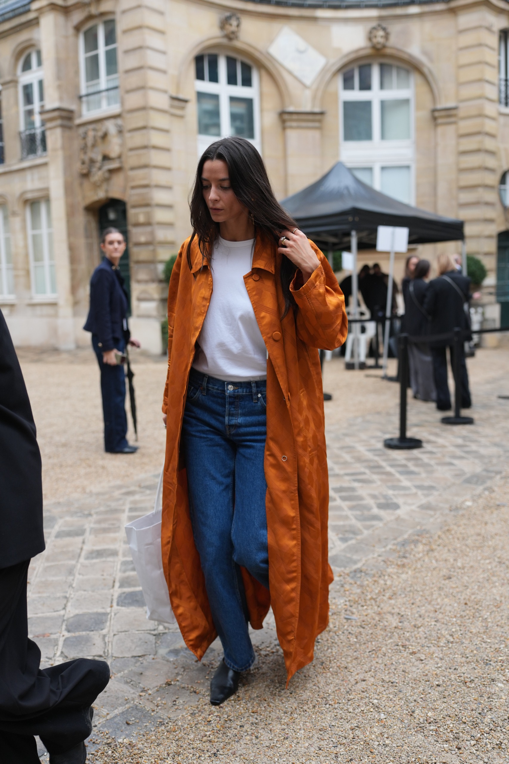 French girls wearing trench coats for fall at Paris Fashion Week