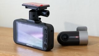 Miofive S1 Ultra dashcam on a wooden table