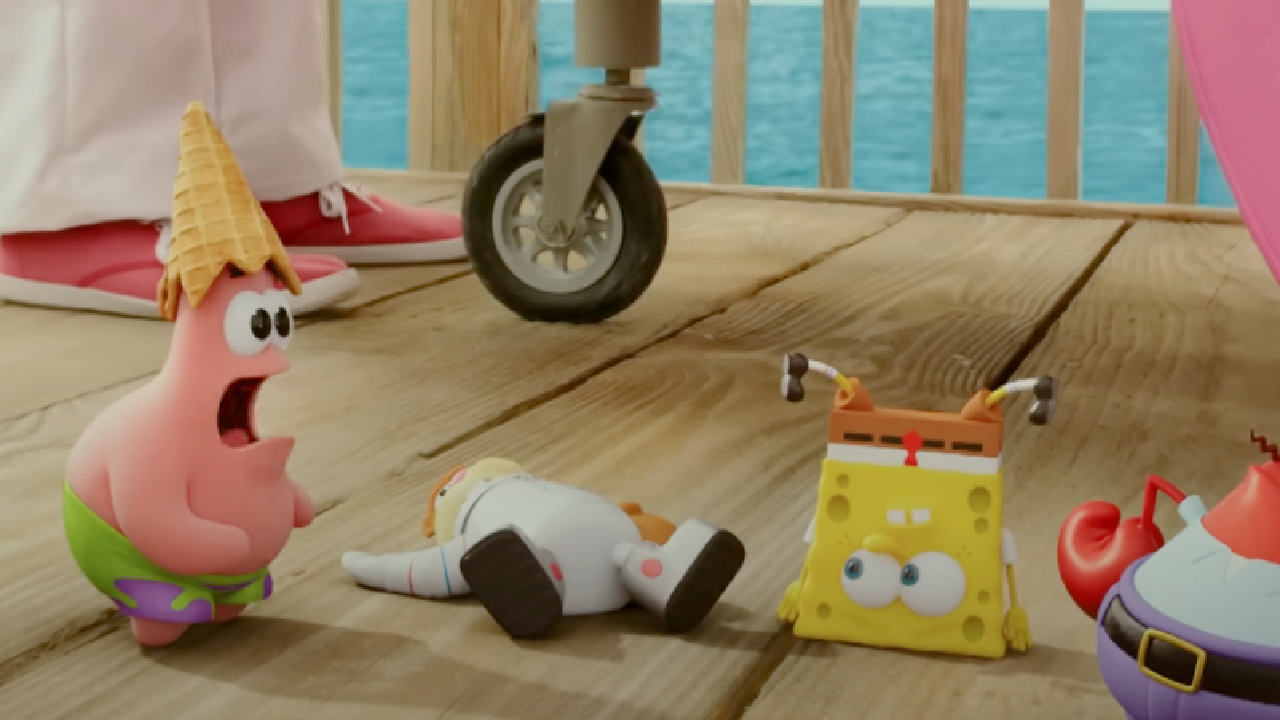 SpongeBob and his friends on a boardwalk in The SpongeBob Movie: Sponge Out Of Water.