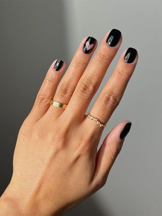 Black Heart Nail Design by Iram Shelton