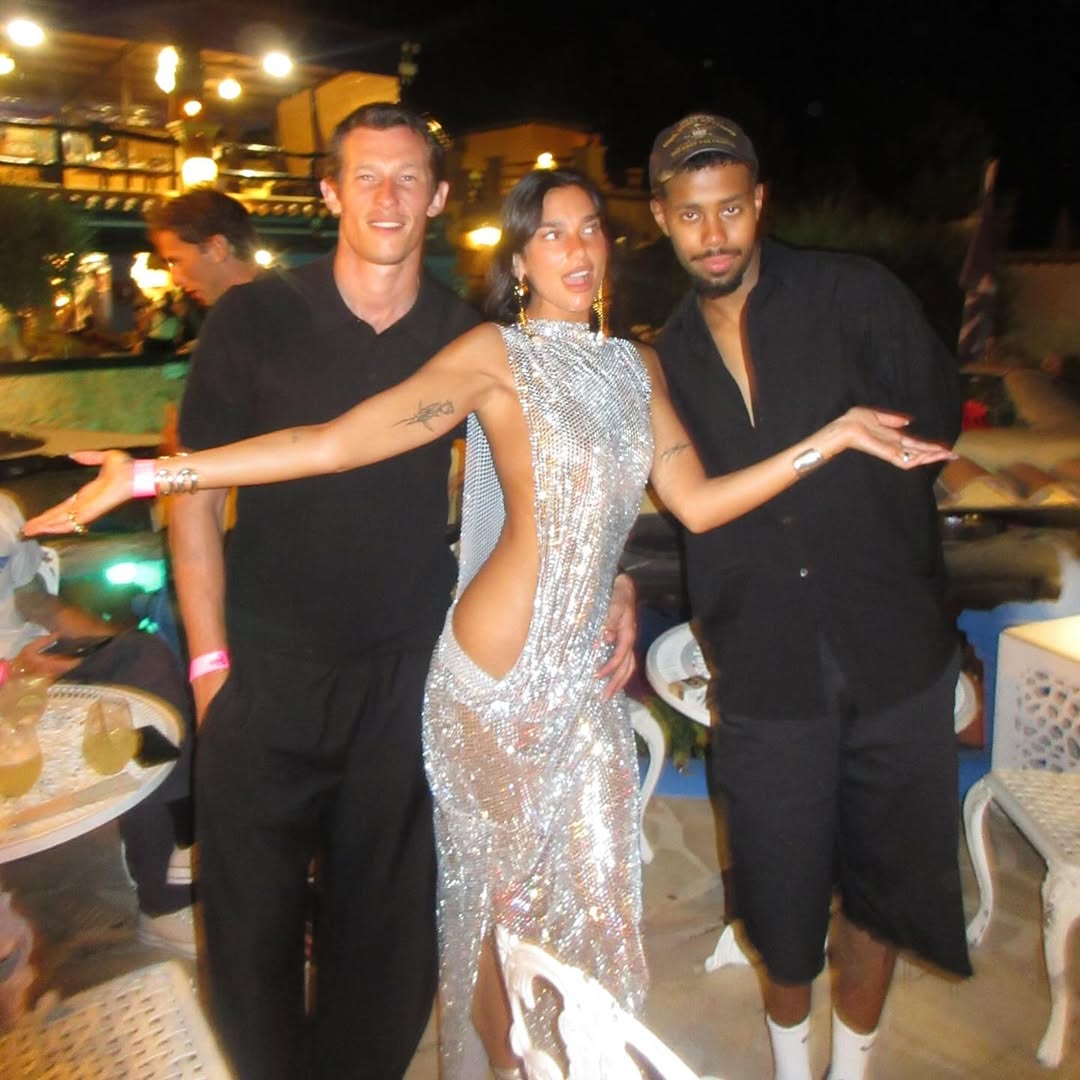 Dua Lipa celebrates her 30th birthday in a custom silver chainmail dress with side splits and open side torso