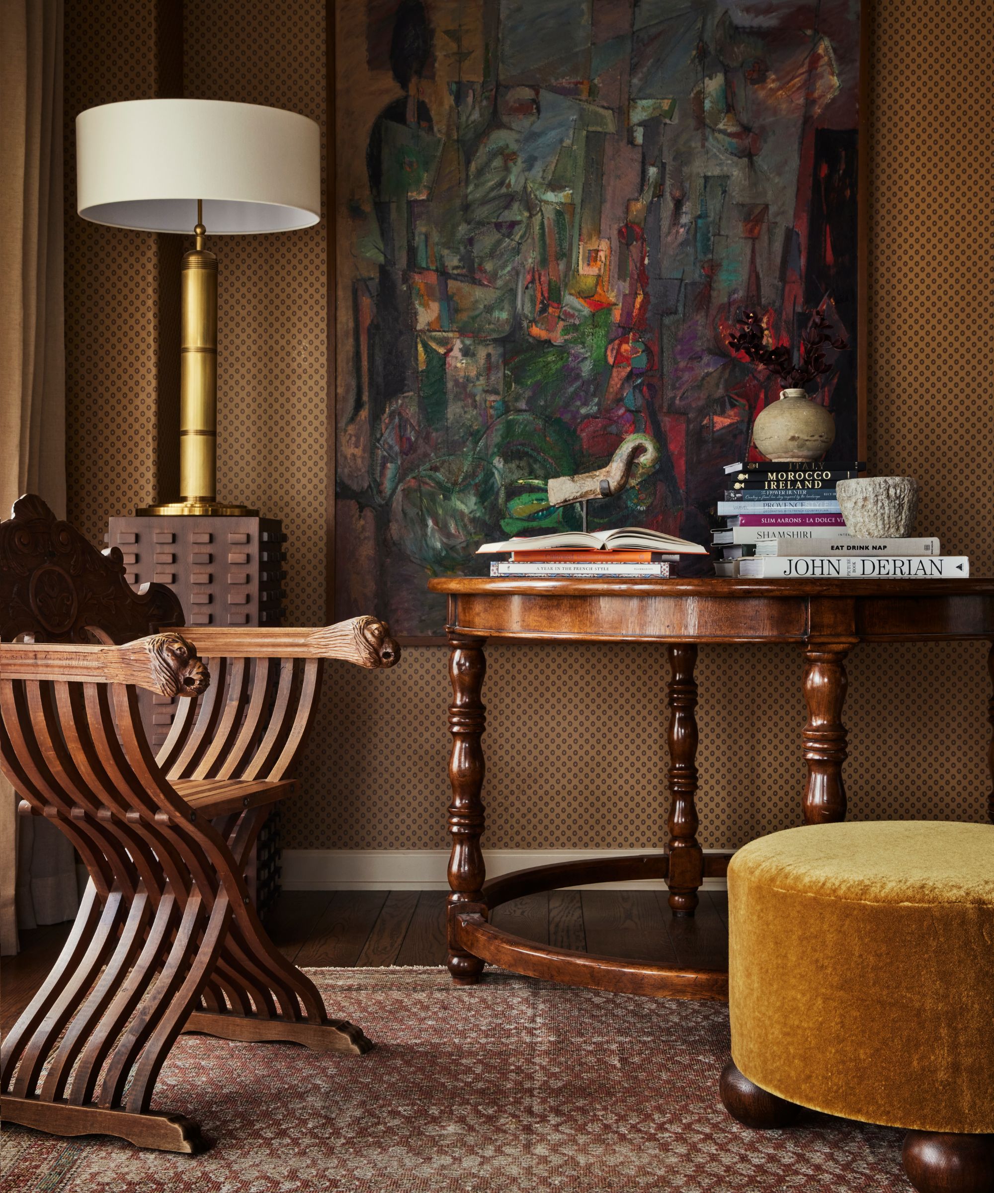 Dark wood antique furniture in a living room by Plaster & Patina