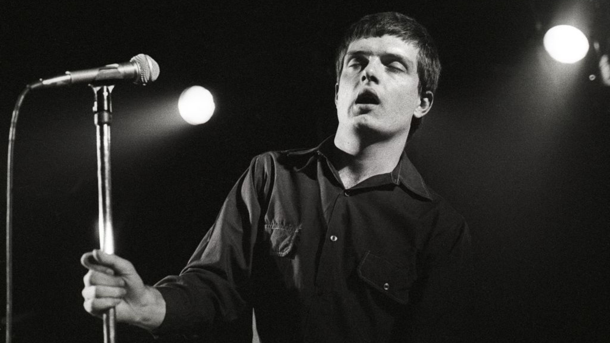 NETHERLANDS - JANUARY 16: ROTTERDAM Photo of Joy Division, Ian Curtis performing live onstage at the Lantaren