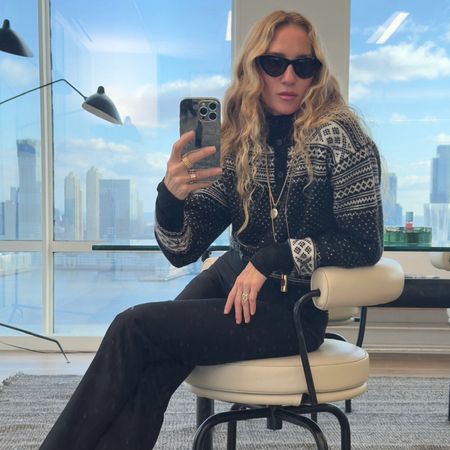 @olympiamarie wearing one of the best j-crew sweaters.