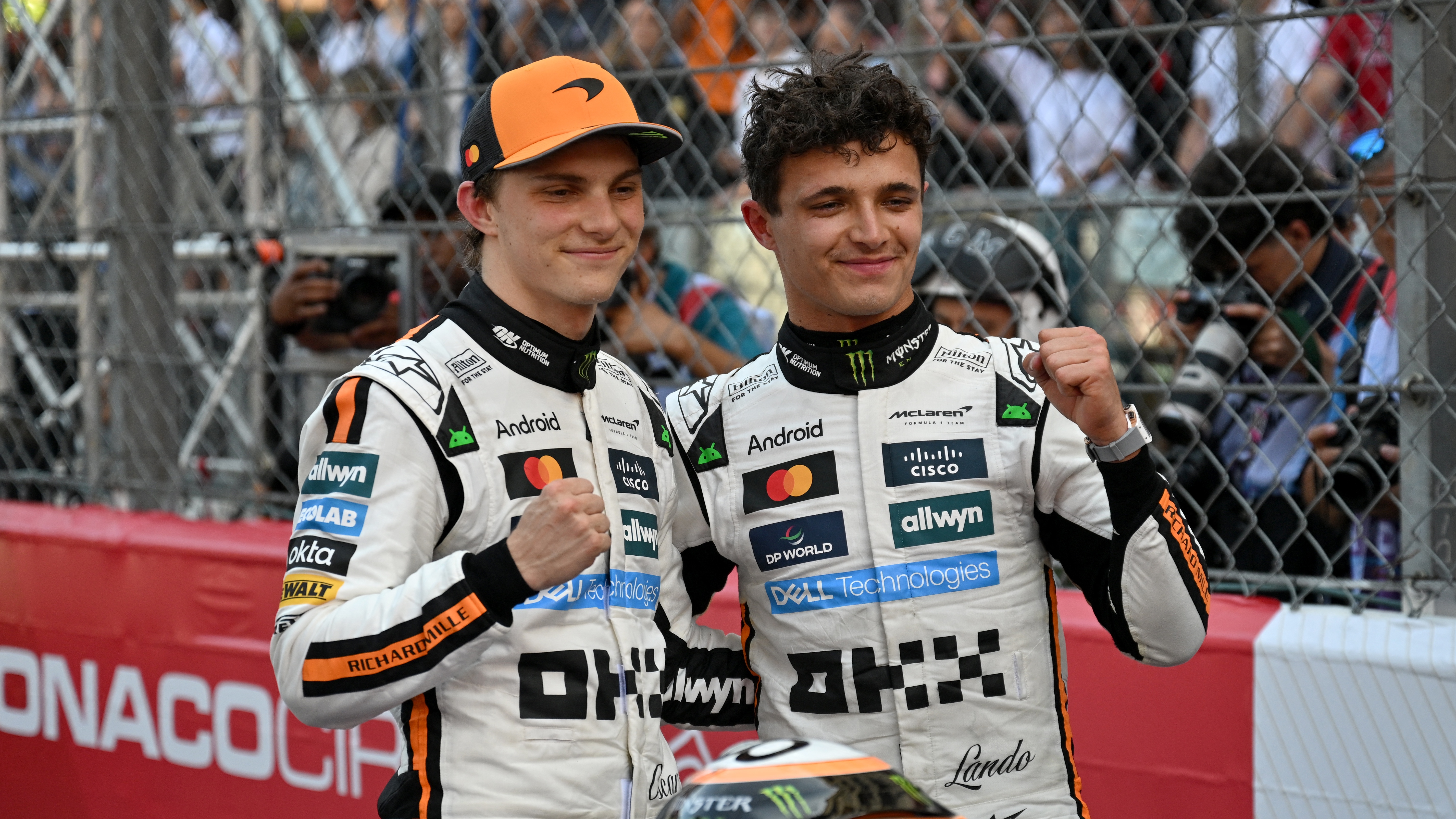 Lando Norris and Oscar Piastri celebrate after Norris' win at the Monaco GP.
