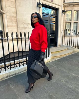 @nlmarilyn wearing a red jumper and column skirt