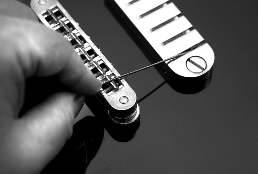 Restringing a guitar