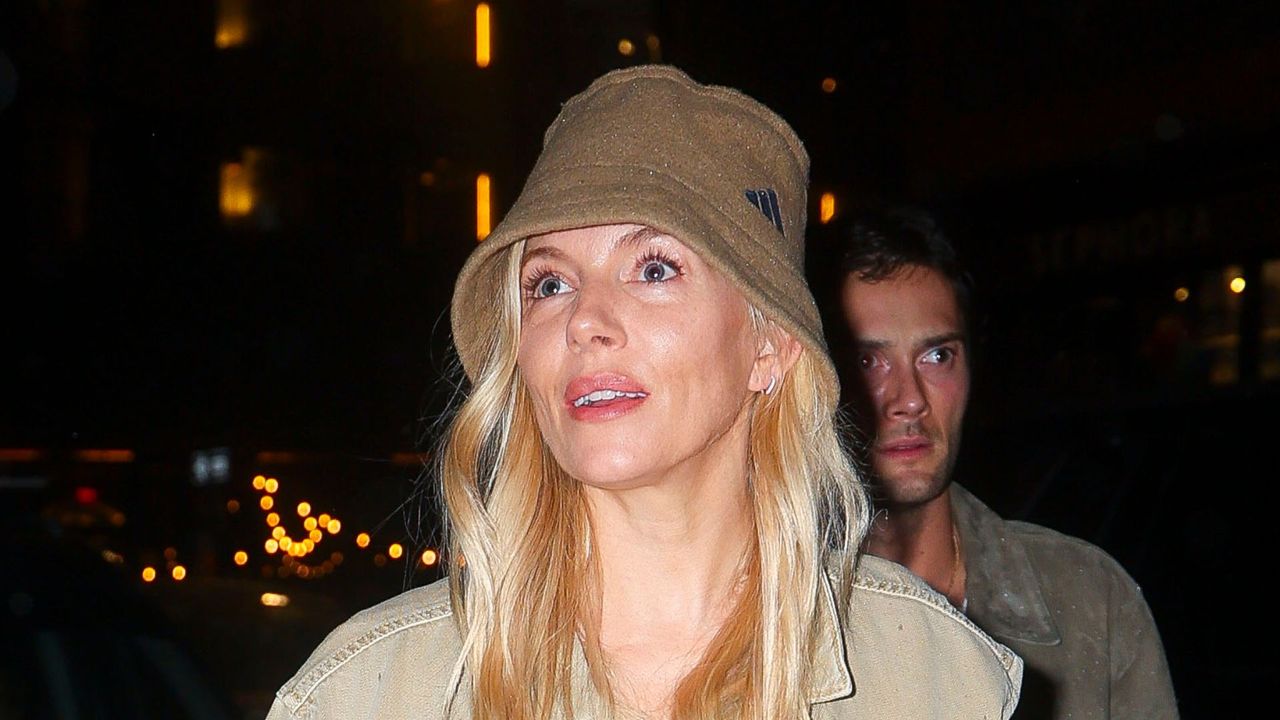 Sienna Miller wearing Adidas bucket hat and corduroy jeans in New York on November 21, 2024