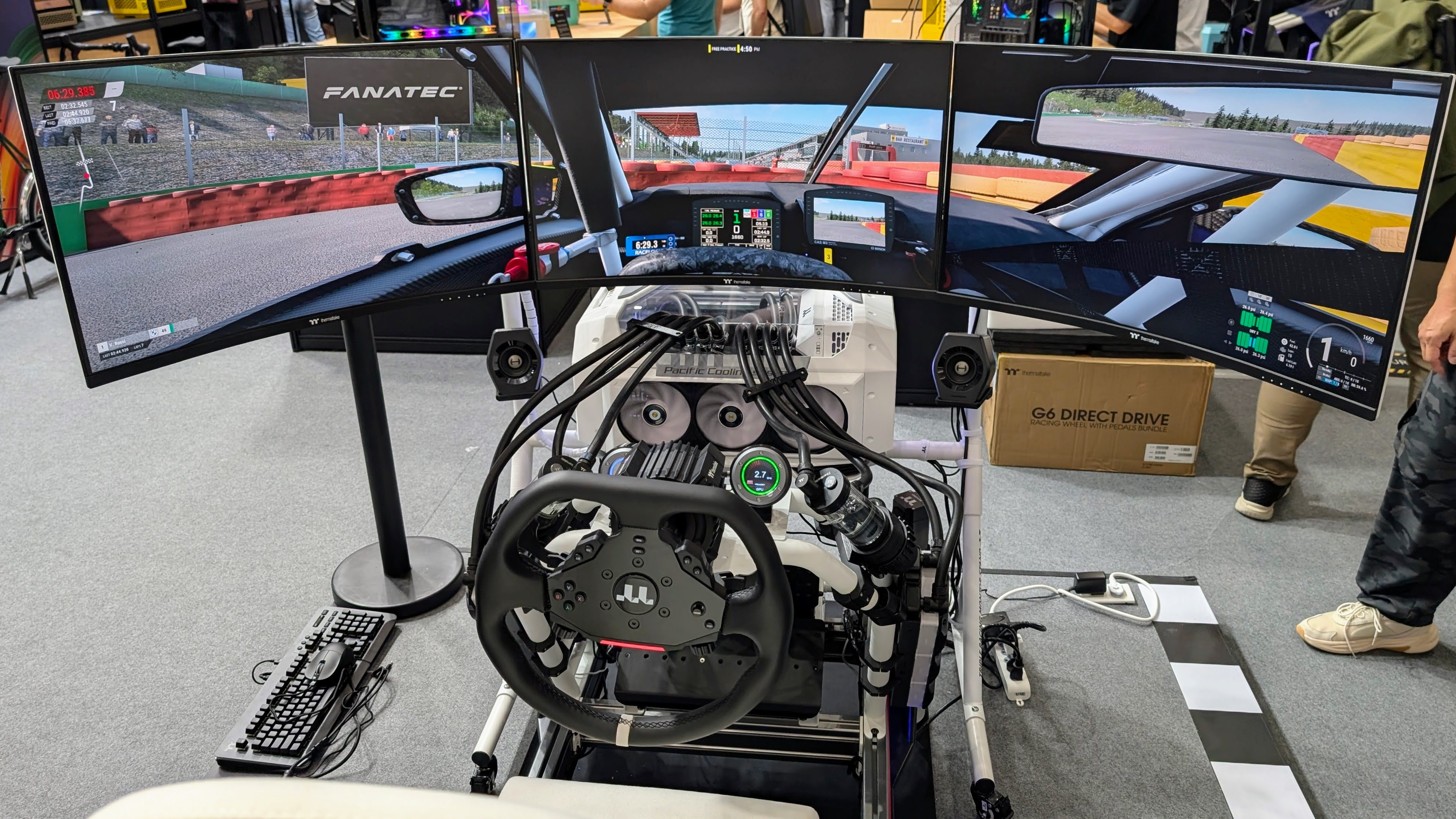 Thermaltake racing sim with custom case mod at Computex 2025