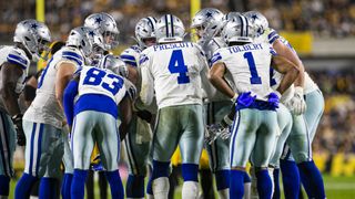 Dallas Cowboys quarterback Dak Prescott (4), huddled with his team, calls a play ahead of the Cowboys vs Lions live stream in NFL Week 6, 2024