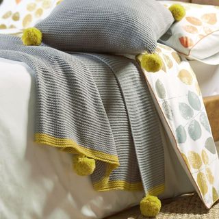 knitted throw with set of cushions