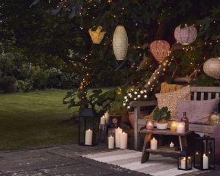 garden party at night with lights and decorations