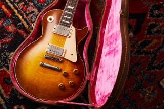A Gibson Certified Vintage 1959 Les Paul Standard sits in its case
