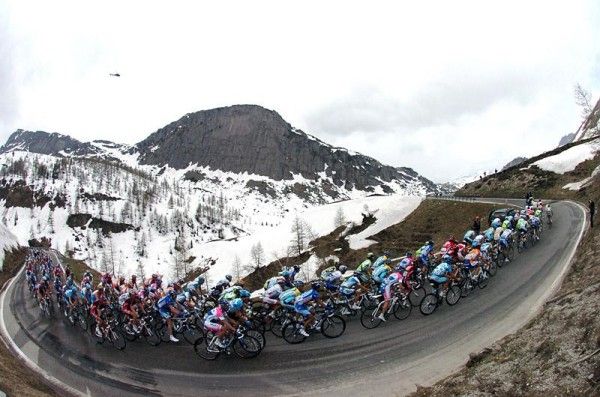 The peloton climbs Passo Rolle early in stage five.