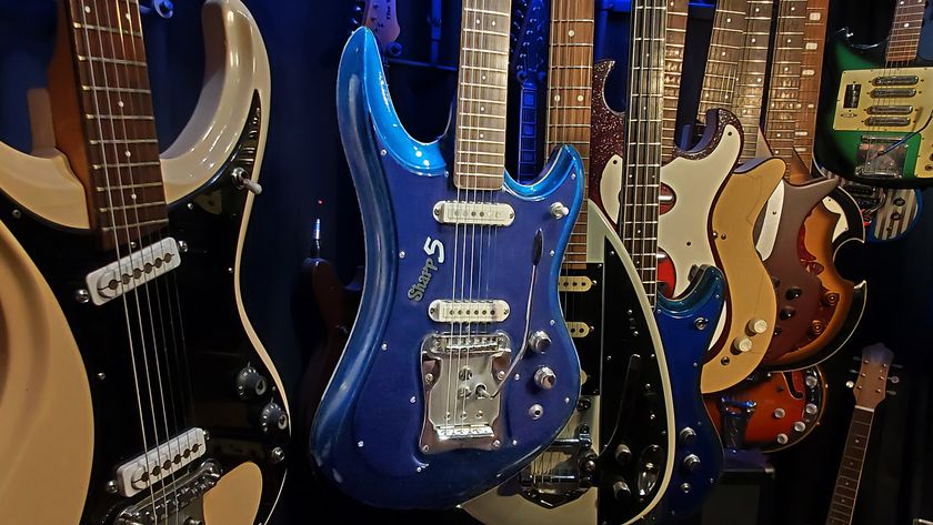 A collection of 1960s Japanese guitars, with a blue Guyatone LG 350-T "Sharp 5" at the center