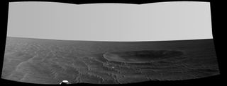 NASA's 1969 Apollo 12 mission to the moon. The crater is 33 feet (10 meters) wide. NASA's Opportunity rover recorded this view of the crater during on Nov. 4, 2010.