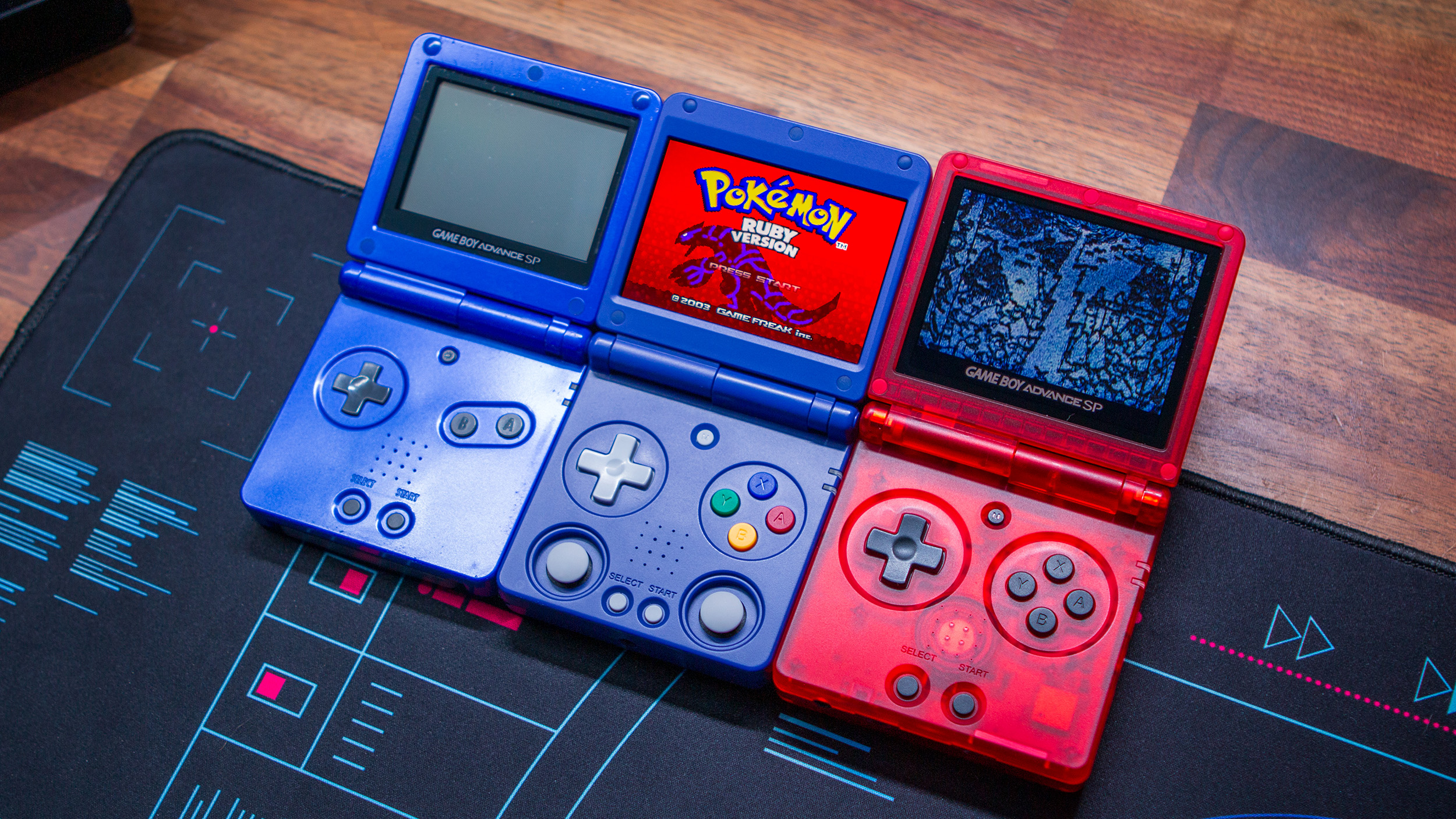Game Boy Advance SP with Anbernic RG34XXSP and RG35XXSP