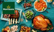 Morrisons logo placed over a birds eye shot of a dinner table at christmas