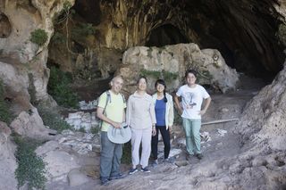 Standing in the entrance to Raqefet Cave, where they found evidence for the oldest man-made alcohol in the world, are, from left, Dani Nadel, Li Liu, Jiajing Wang and Hao Zhao.