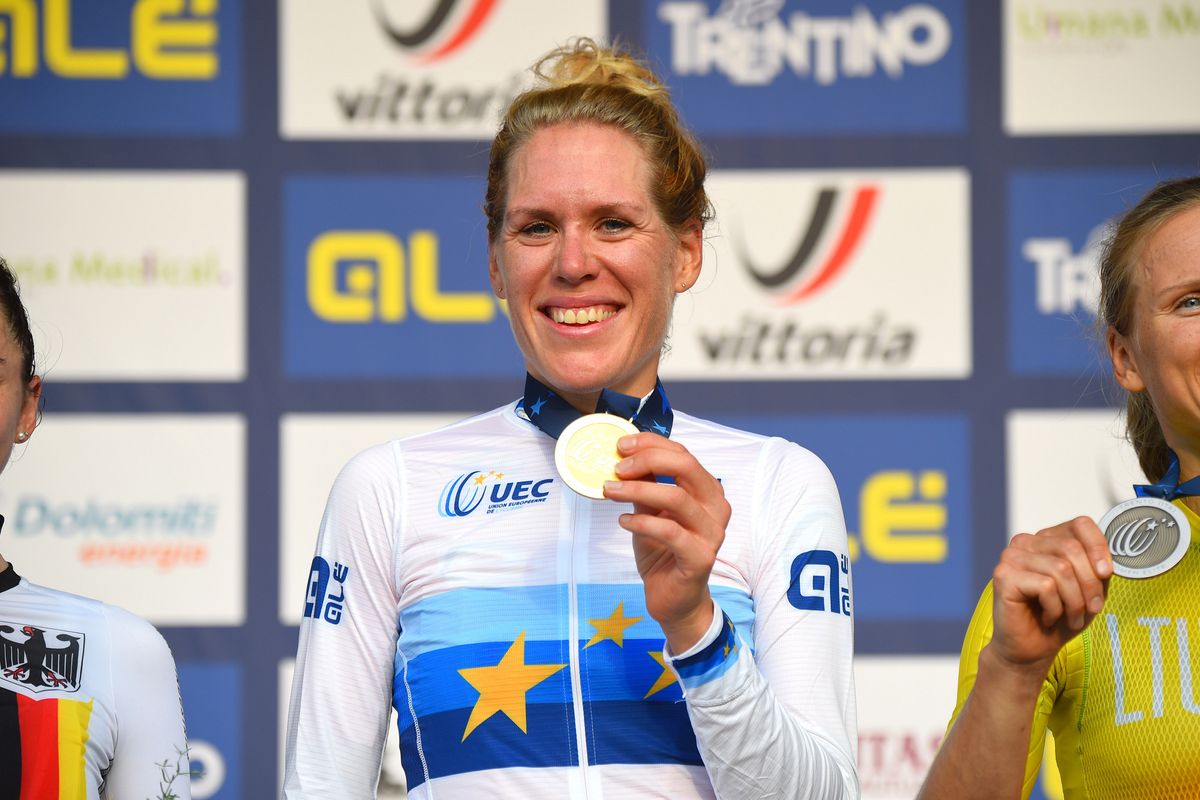 Ellen Van Dijk shows off her European Championship gold medal and jersey