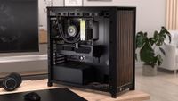 Corsair's Frame 5000D case (in black) with wooden front panel, and side panel open