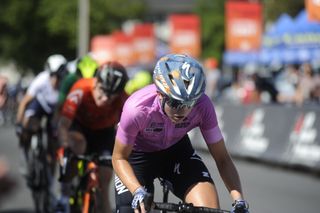 Skylar Schneider (L39ION of Los Angeles) in pink leader's jersey during stage 4 criterium at Joe Martin Stage Race