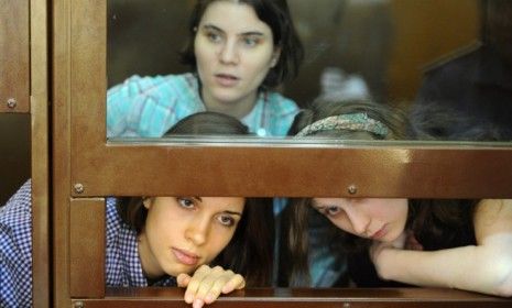 Three members of the punk band Pussy Riot â€” Nadezhda Tolokonnikova (left), Yekaterina Samutsevich (center), and Maria Alyokhina (right) â€” attend a court hearing July 30.