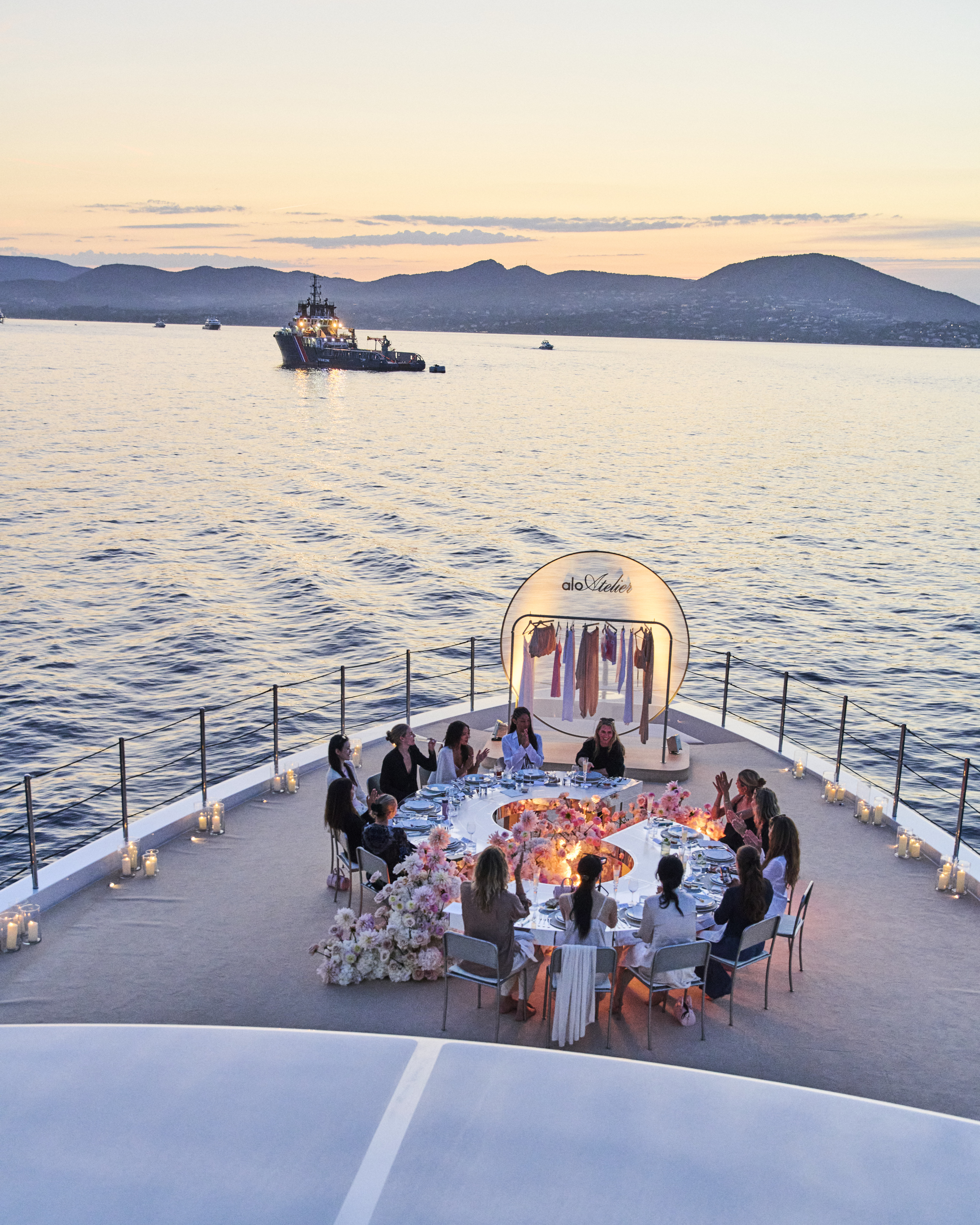 A photo of the first-night Alo dinner on the yacht celebrating Alo Atelier.