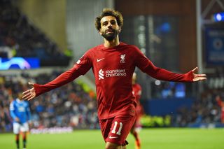 Mohamed Salah celebrates after scoring a hat-trick for Liverpool against Rangers in October 2022.