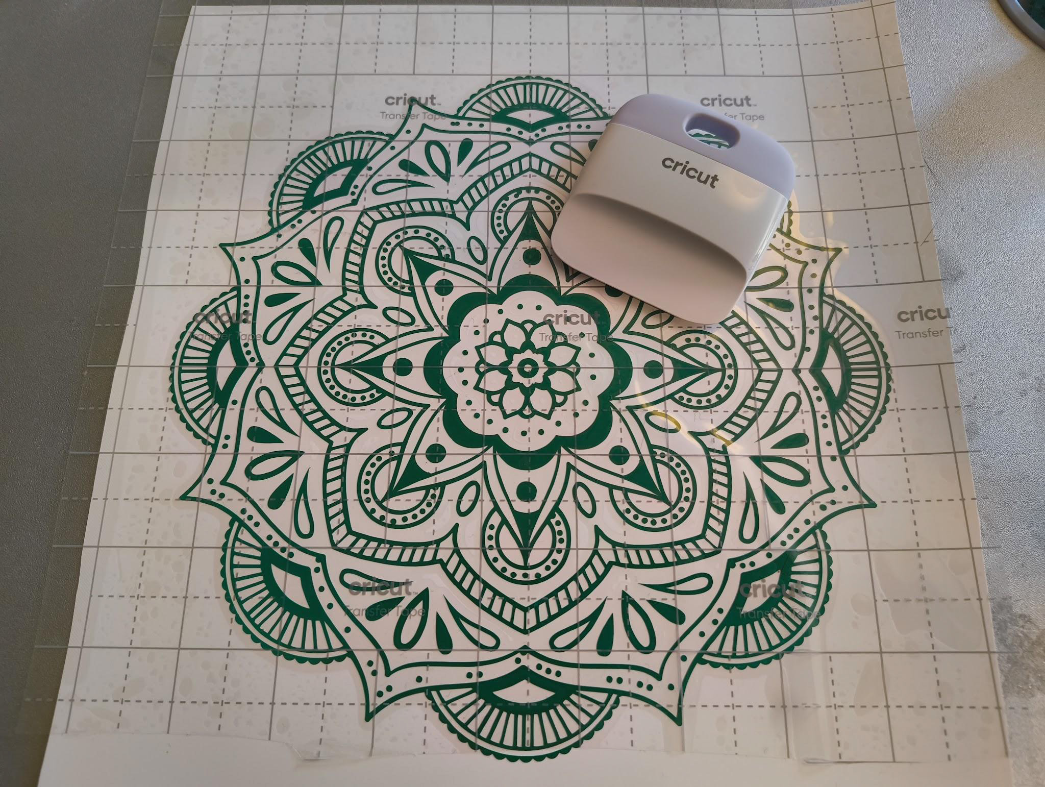 How to use Cricut transfer tape; photos of a person making a print design