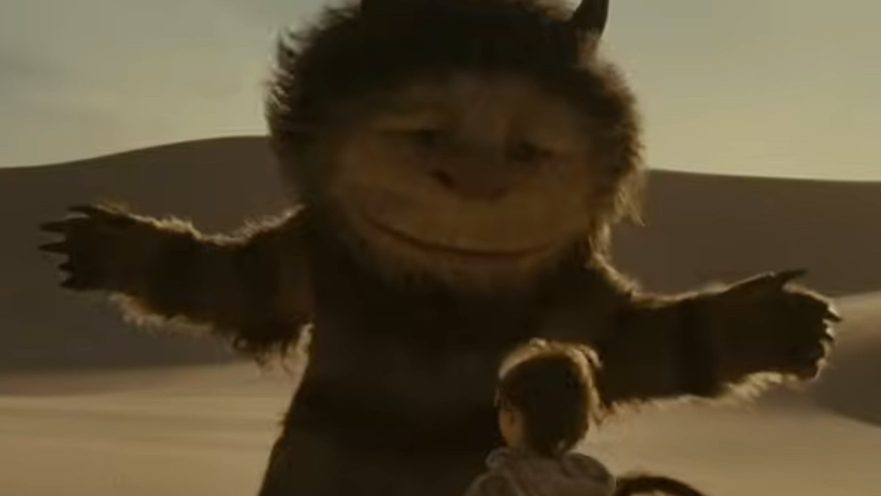 Carol the Wild Thing with his arms spread open in Where the Wild Things Are