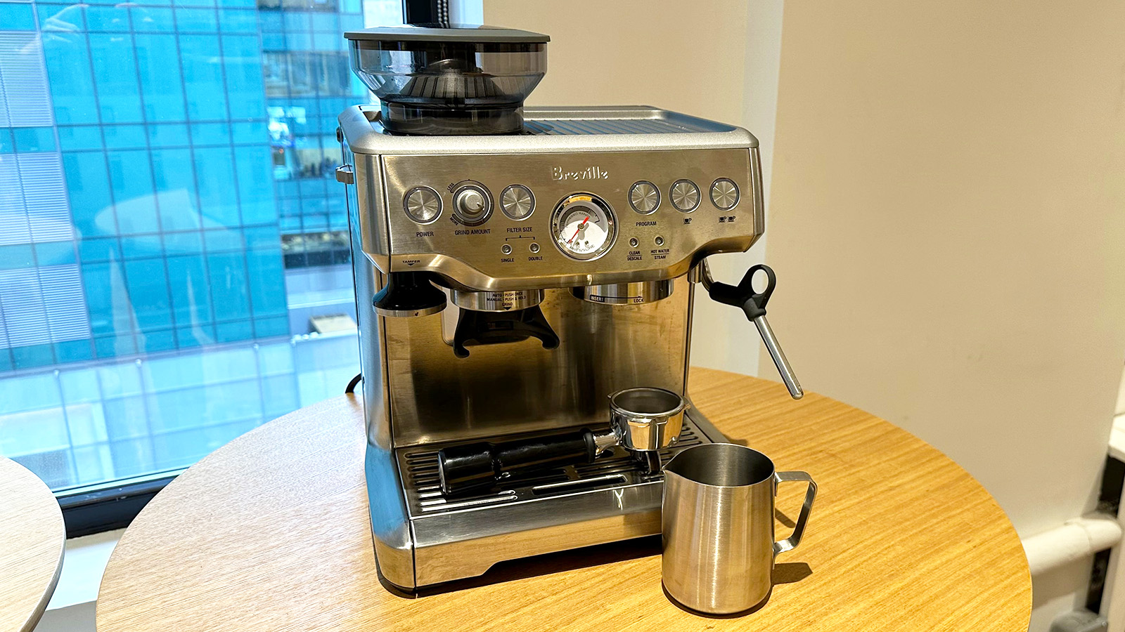 Breville Barista Express on a wooden table