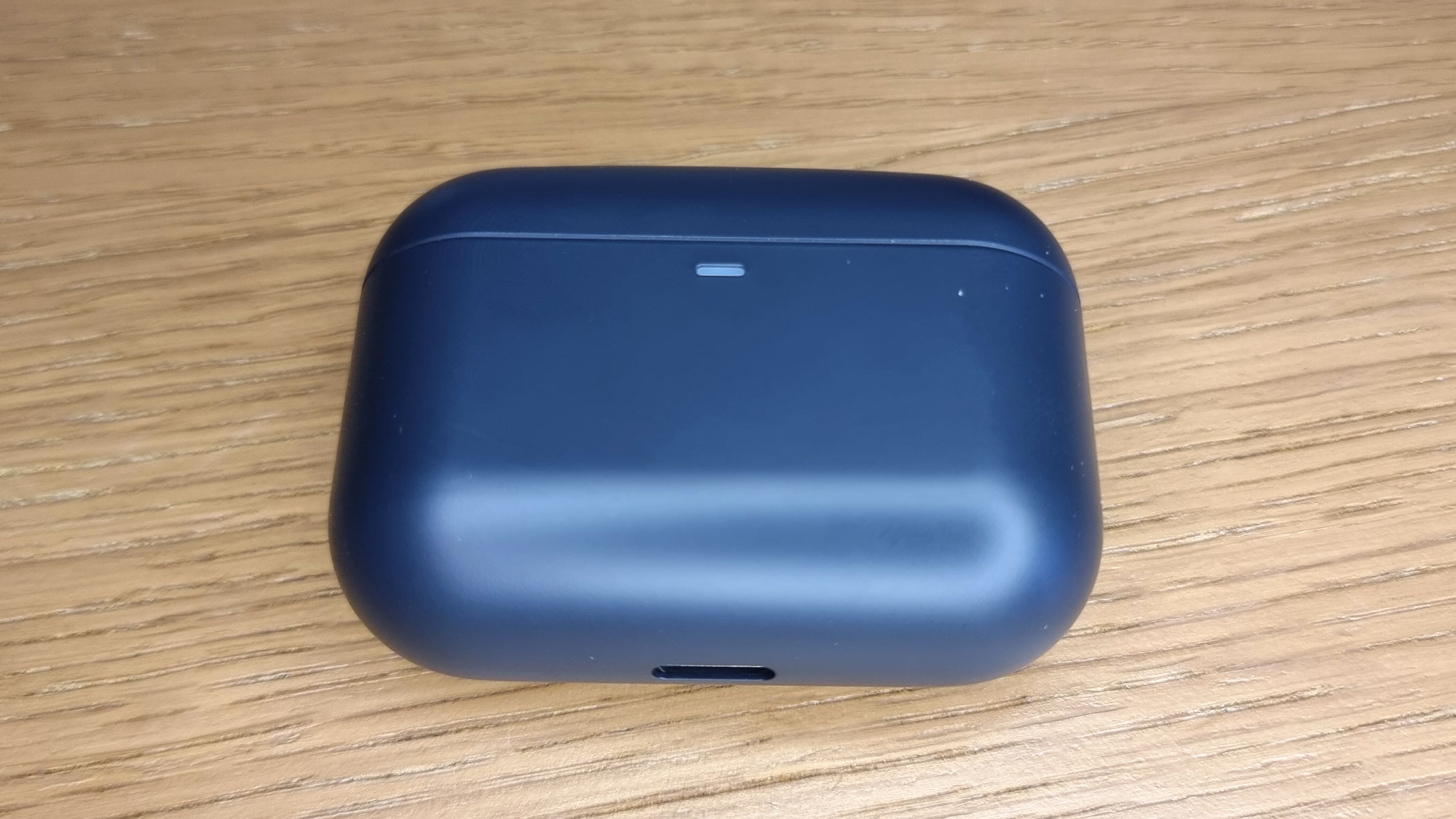 a picture of the Final ZE500 earbuds in a closed charging case