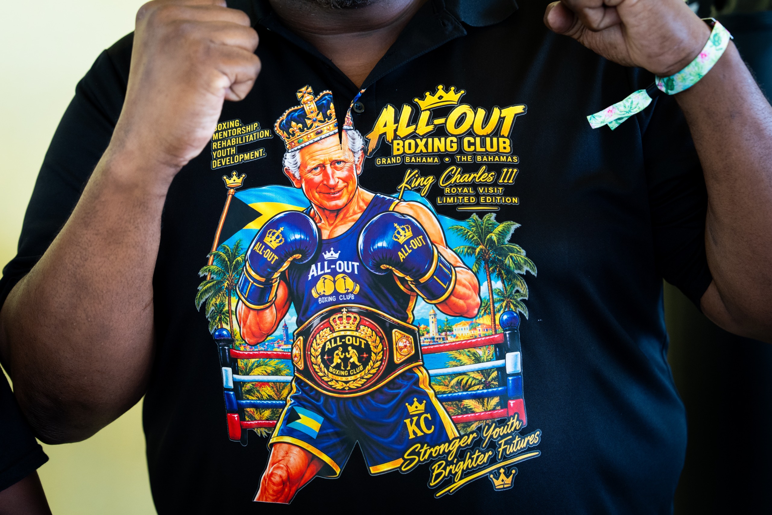 A man wearing a shirt with King Charles as a boxer