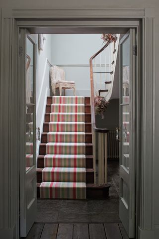 Colorful stair runner in a hallway