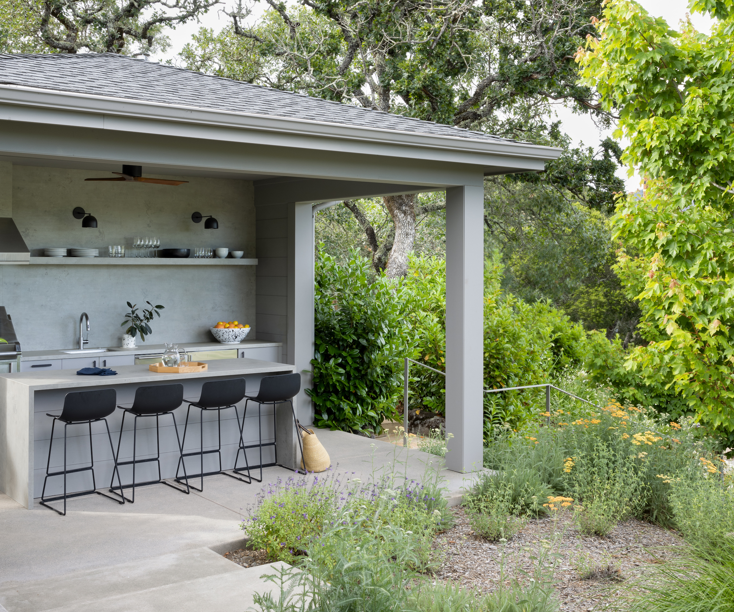 covered outdoor kitchen and island